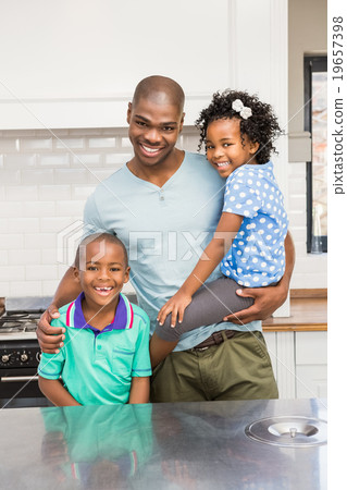 Father and kids in the kitchen Father and kids in the kitchen 19657398