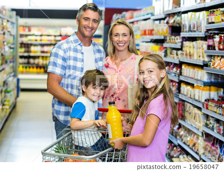 Happy family at the supermarket 19658047