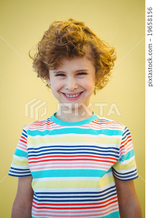 Smiling boy looking at the camera Smiling boy looking at the camera 19658156