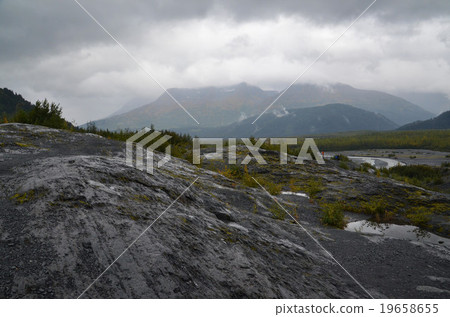 The Lissa River flowing between the rocks that the exit glacier scraped 19658655