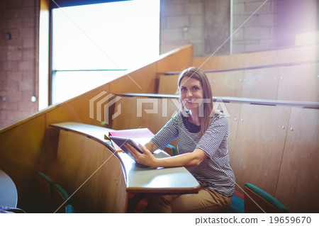 Mature student in lecture hall 19659670