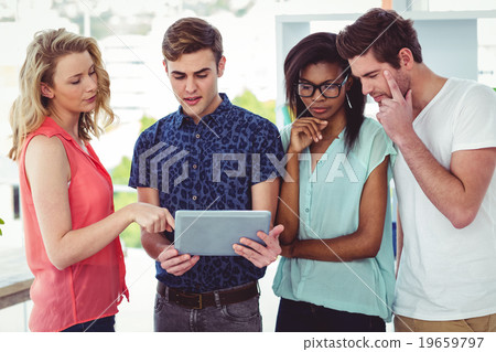 Smiling creative team working together 19659797
