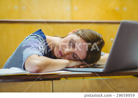 Mature student in lecture hall Mature student in lecture hall 19659959
