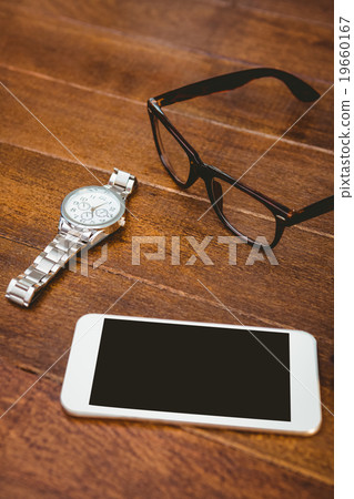 Close up view of smartphone and glasses Close up view of smartphone and glasses 19660167