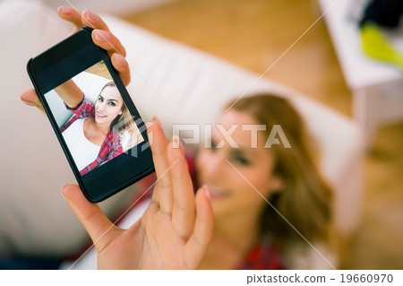 Pretty blonde taking a selfie 19660970