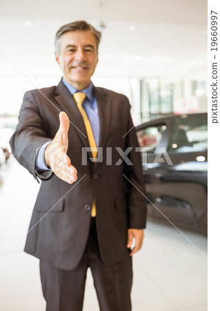 Businessman ready to shake hand 19660997