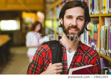 Smiling student in the library 19661005