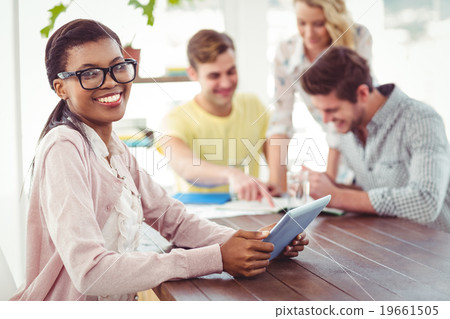 Creative business team working hard together 19661505