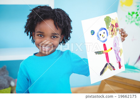 Stock Photo: Happy kid enjoying arts and crafts painting