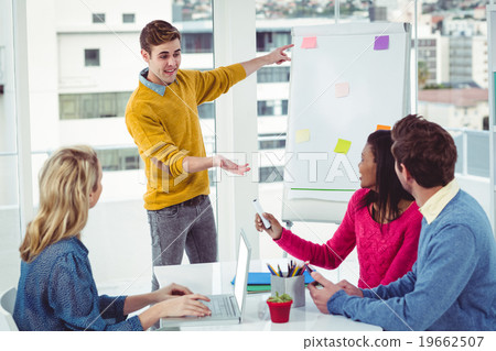 Creative businessman giving a presentation 19662507