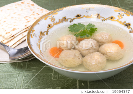 Chicken soup with Kneidlach (Matzah bolls) 19664577