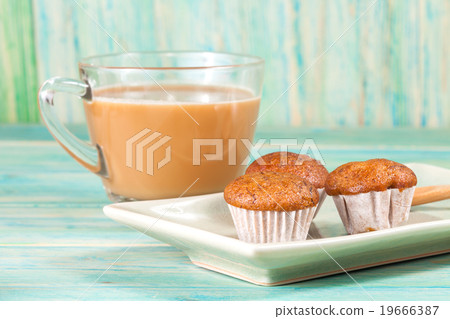 banana cup cake on wood deck . banana cup cake on wood deck . 19666387