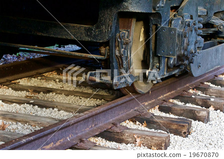 The old train wheels and a rusty rail road The old train wheels and a rusty rail road 19670870