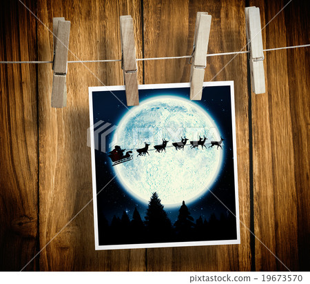 Composite image of photo hanging from line 19673570