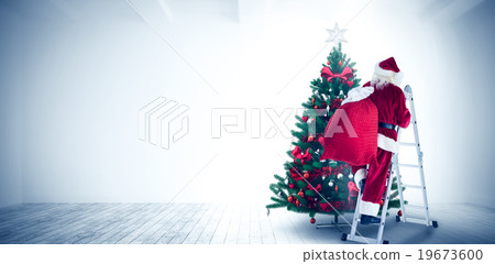 Composite image of santa steps up a ladder 19673600