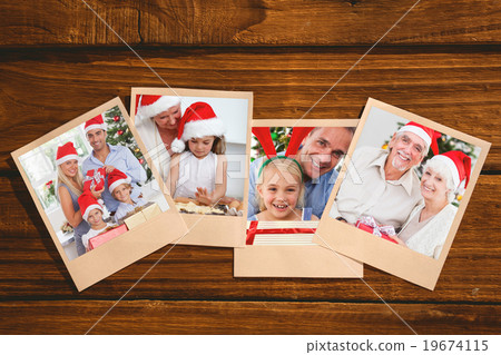Composite image of smiling old couple swapping christmas gifts Composite image of smiling old couple swapping christmas gifts 19674115