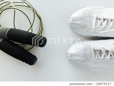 close up of sneakers and skipping rope close up of sneakers and skipping rope 19674527