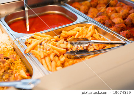 close up french fries of and other dishes on tray close up french fries of and other dishes on tray 19674559