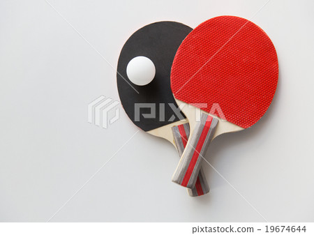 close up of table tennis rackets with ball 19674644
