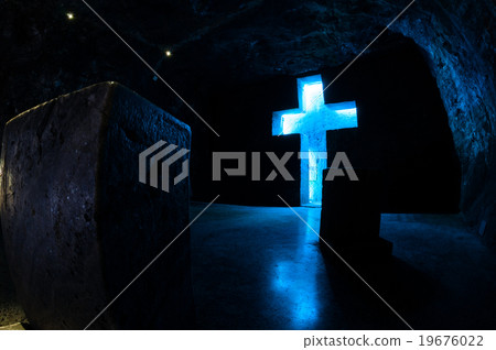 Tombstone and cross with blue light in salt 19676022