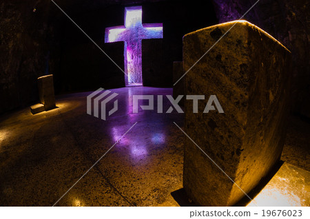 Tombstone and cross with purple light in salt 19676023
