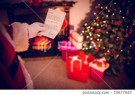 Composite image of santas list 19677683