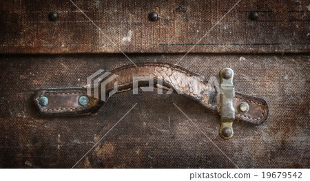 Old canvas trunk handle close up 19679542