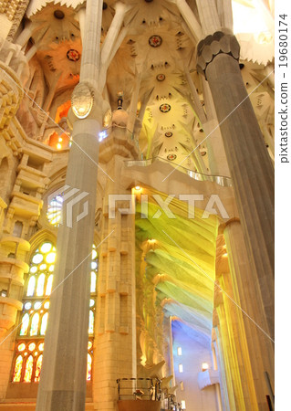 Stained glass light dazzling Sagrada Familia Stained glass light dazzling Sagrada Familia 19680174