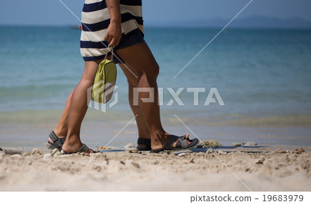 feet of people walk the beach feet of people walk the beach 19683979