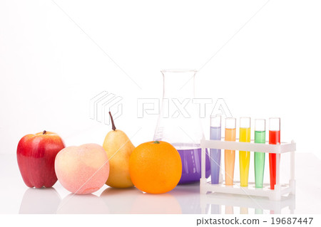 Fruit close chemical test tubes. Genetic 19687447