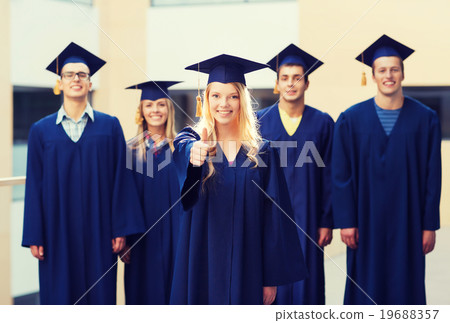 group of smiling students in mortarboards 19688357