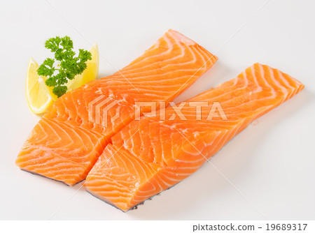 Raw salmon fillets Raw salmon fillets 19689317