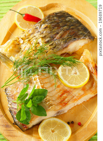 Oven baked carp fillet Oven baked carp fillet 19689719