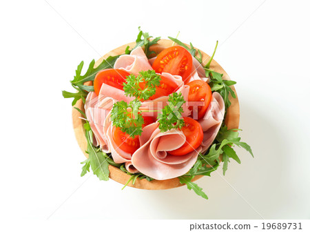 Sliced ham with arugula and tomatoes Sliced ham with arugula and tomatoes 19689731