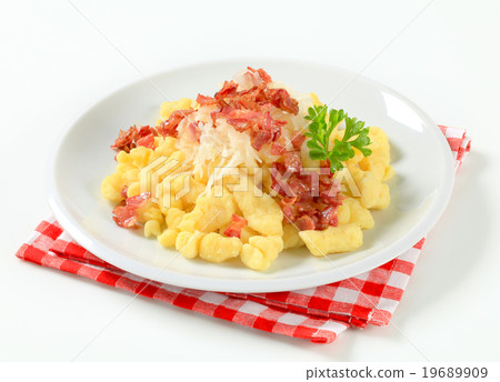 Small potato dumplings with bacon and cabbage 19689909