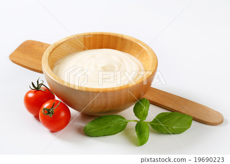 Creamy sauce in wooden bowl 19690223