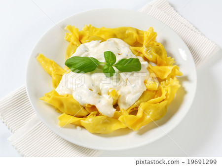 Stuffed pasta with cheese sauce Stuffed pasta with cheese sauce 19691299