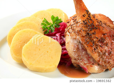 Roast duck with potato dumplings and red cabbage 19691382