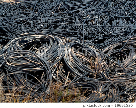Piles of waste cables 19691580