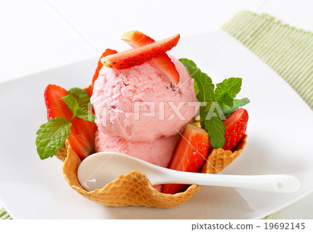 Strawberry ice cream in waffle basket Strawberry ice cream in waffle basket 19692145