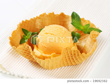 Orange sherbet in a waffle basket 19692382