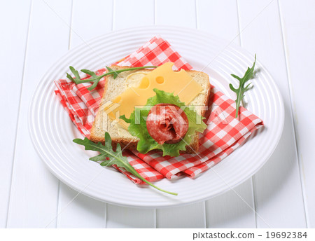 Bread with Swiss cheese and salami Bread with Swiss cheese and salami 19692384