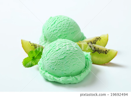 Scoops of light green ice cream 19692494