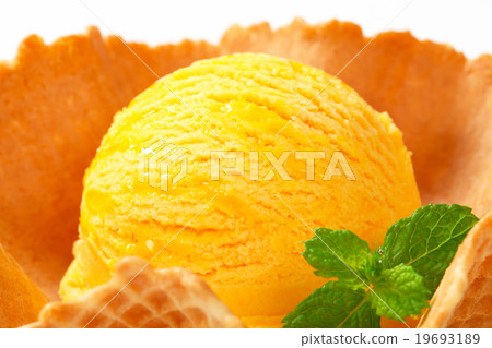 Lemon custard ice cream in a wafer bowl 19693189