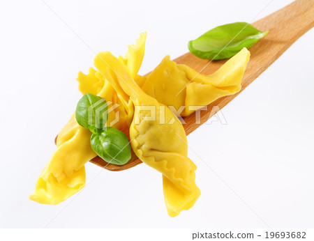 Stuffed pasta on wooden spatula 19693682