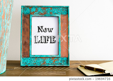 Vintage photo frame with text NEW LIFE Vintage photo frame with text NEW LIFE 19694716