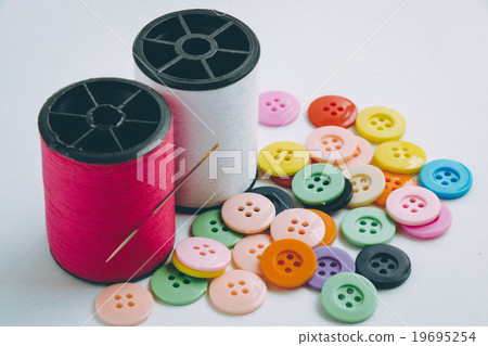 Needle with thread, buttons, sew instrument. Needle with thread, buttons, sew instrument. 19695254