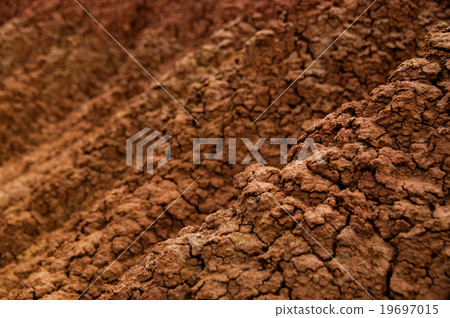 Closeup of Drought red orange sand stone rock Closeup of Drought red orange sand stone rock 19697015