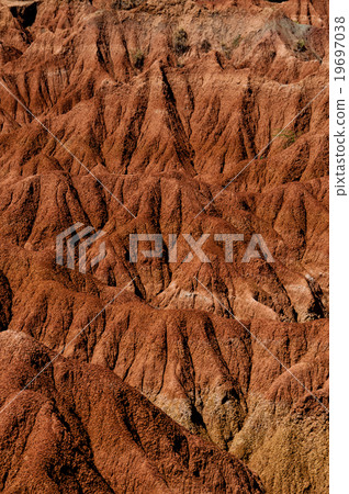 Closeup of Drought red orange sand stone rock Closeup of Drought red orange sand stone rock 19697038