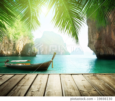 Adaman sea and wooden boat in Thailand 19698130